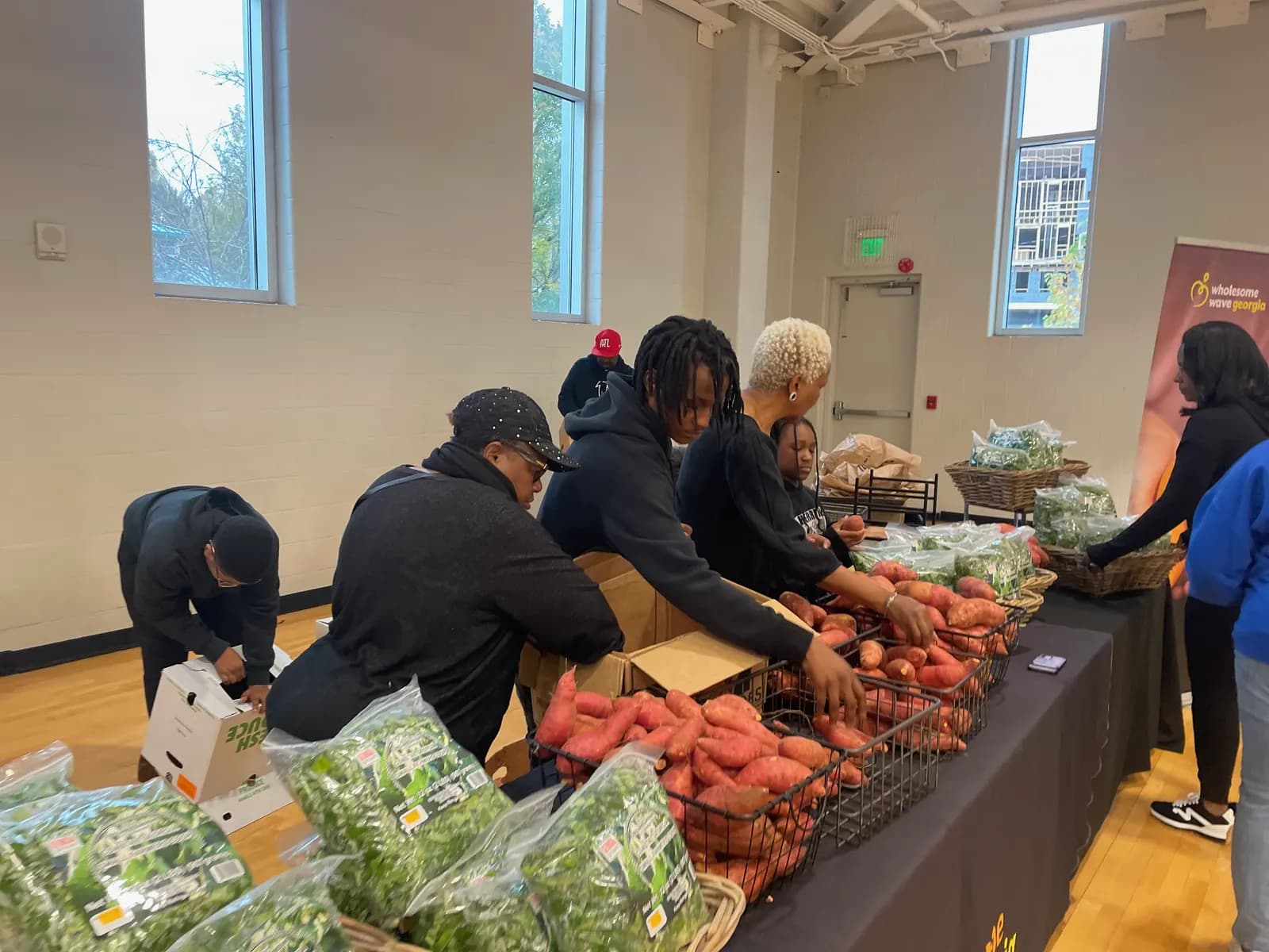 Volunteers preparing food boxes