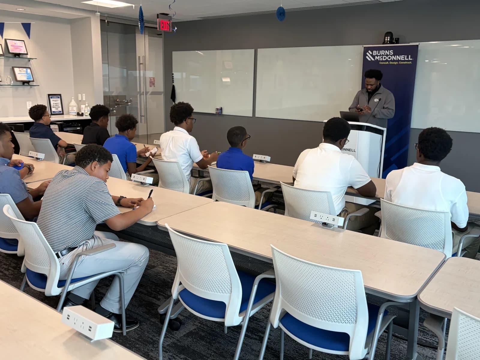Students seated at tables during the engineering camp